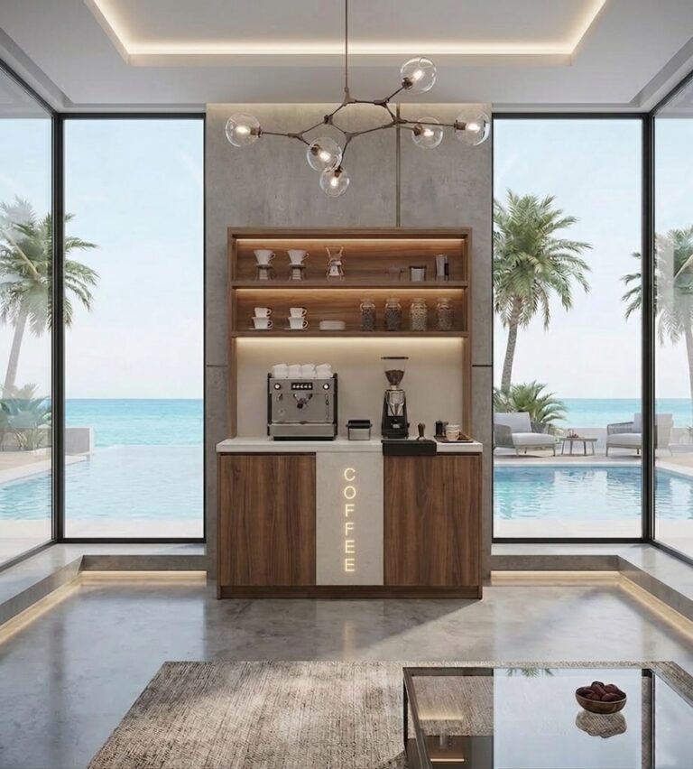 Walnut coffee bar with espresso machine and lit shelves beside a poolside window